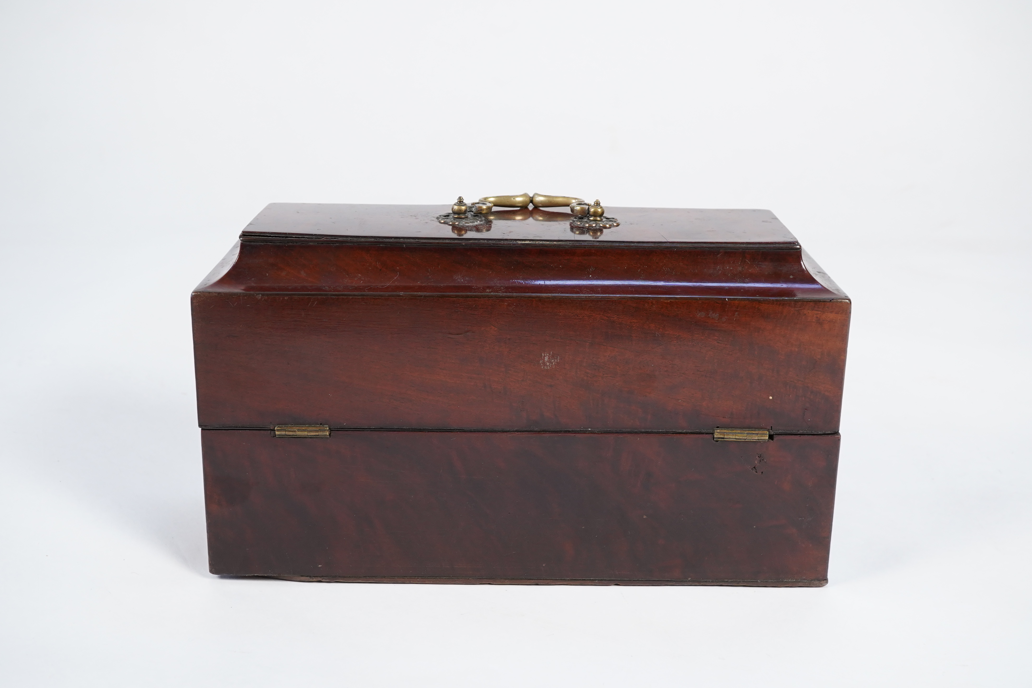 A George II mahogany cased set of two early George III silver tea caddies and covers and a sugar vase and cover, by Samuel Herbert & Co